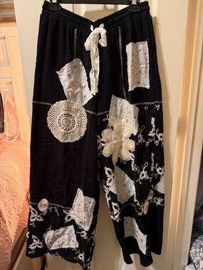 POL Black Wide-Leg Patchwork Pants with Cream Lace Accents